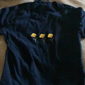 navy blue t shirt which flowers